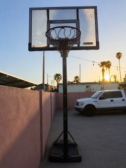 Basketball hoop adjustable
