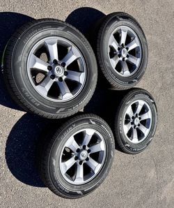 Toyota 4runner Limited gunmetal wheels 265 60 18 new all season tires
