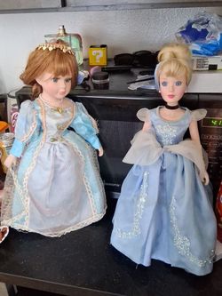 Two Princess Porcelain Dolls in Blue Gowns