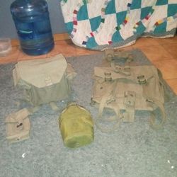 Military Backpack With Stuff That Goes With It