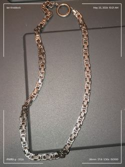 Heavy tactical chain. Quick release in case you need to use it to protect yourself.