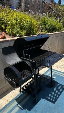 Grill with side smoker