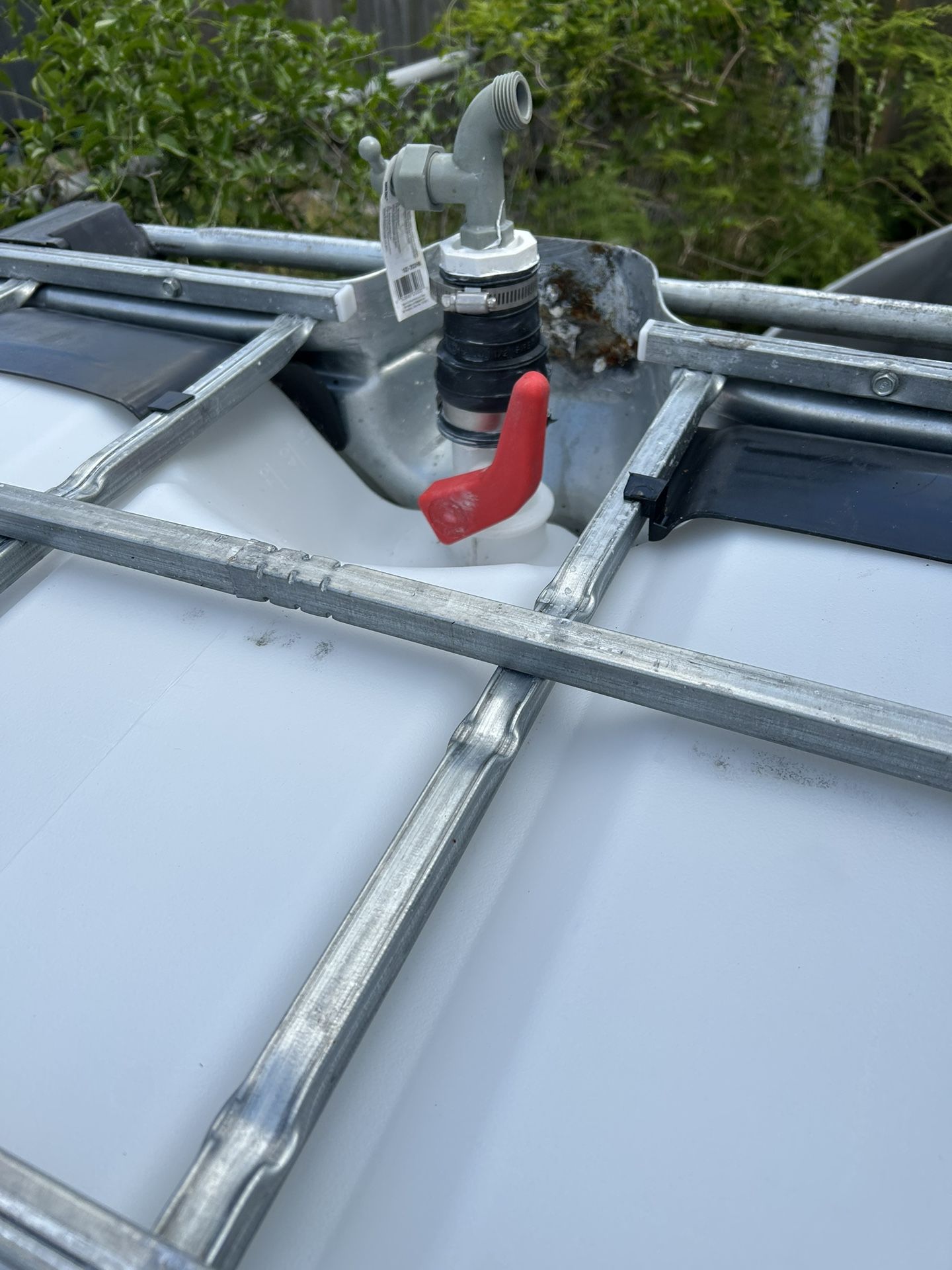 Water tank with spigot