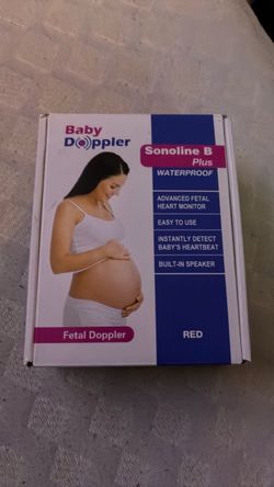 This image shows a Baby Doppler Sonoline B Fetal Doppler, an electronic handheld ultrasound device used to detect fetal heartbeats.