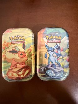 Pokemon Prismatic Tins
