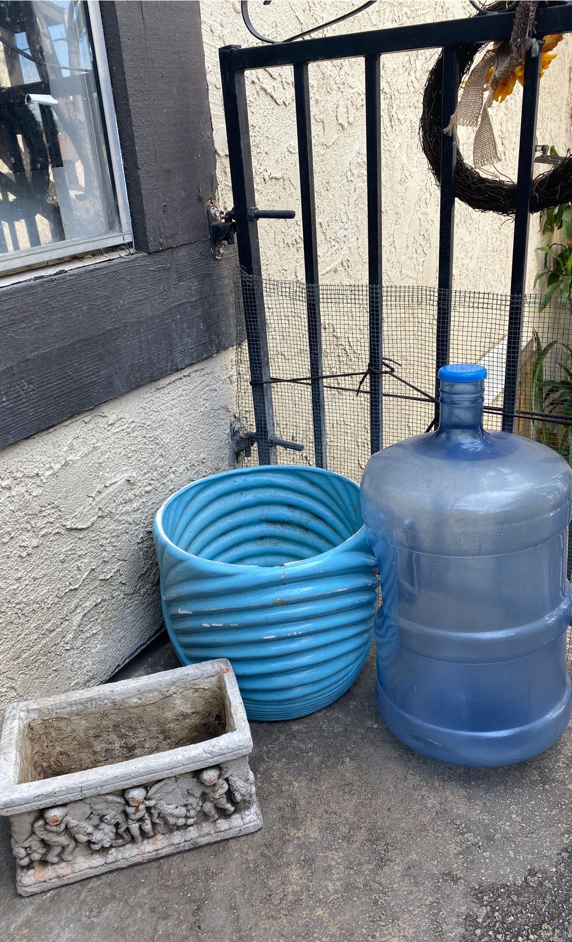 Free pick up only! UPDATE Ceramic angel & gallon water left