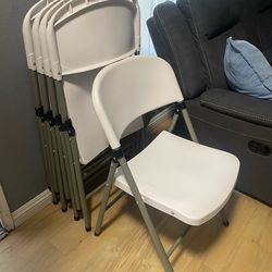 5 Banquet Style white Chairs