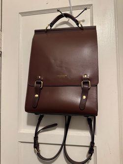 CNOLES  and DESIGN leather