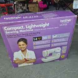 Compact, Lightweight  Sewing Machine 