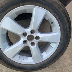 235/55 R 18 Toyota wheel and tire