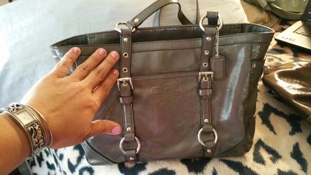 Gray patent coach purse