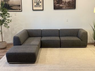 Charcoal gray Kasala modular sectional couch delivery available
