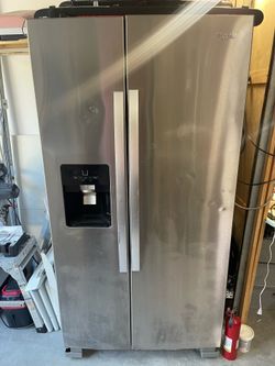 USED !! Whirlpool side by side refrigerator