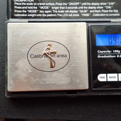 14kt Gold Cross Pendant w/ Diamond. 0.90 grams.