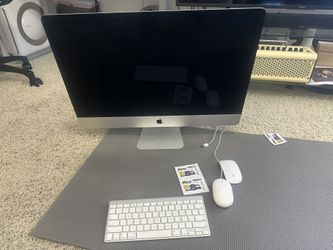 27” iMac Retina 5K (Late 2015) — 3.3GHz i5, Radeon R9 M395, 2TB Fusion, freshly wiped with macOS Monterey.
