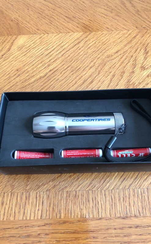 Flash light with Cooper tires logo