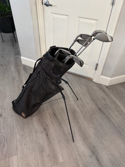 Golf clubs, Highlander tripod bag, balls, & more!