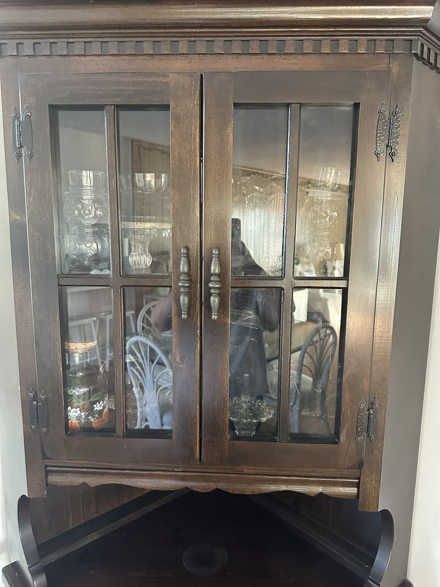 wooden blackish tall cabinet with compartment