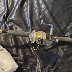Various Fishing Rods With Reels