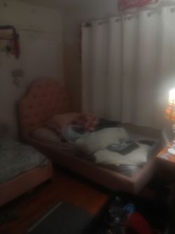 2 pink twin beds, dresser, desk