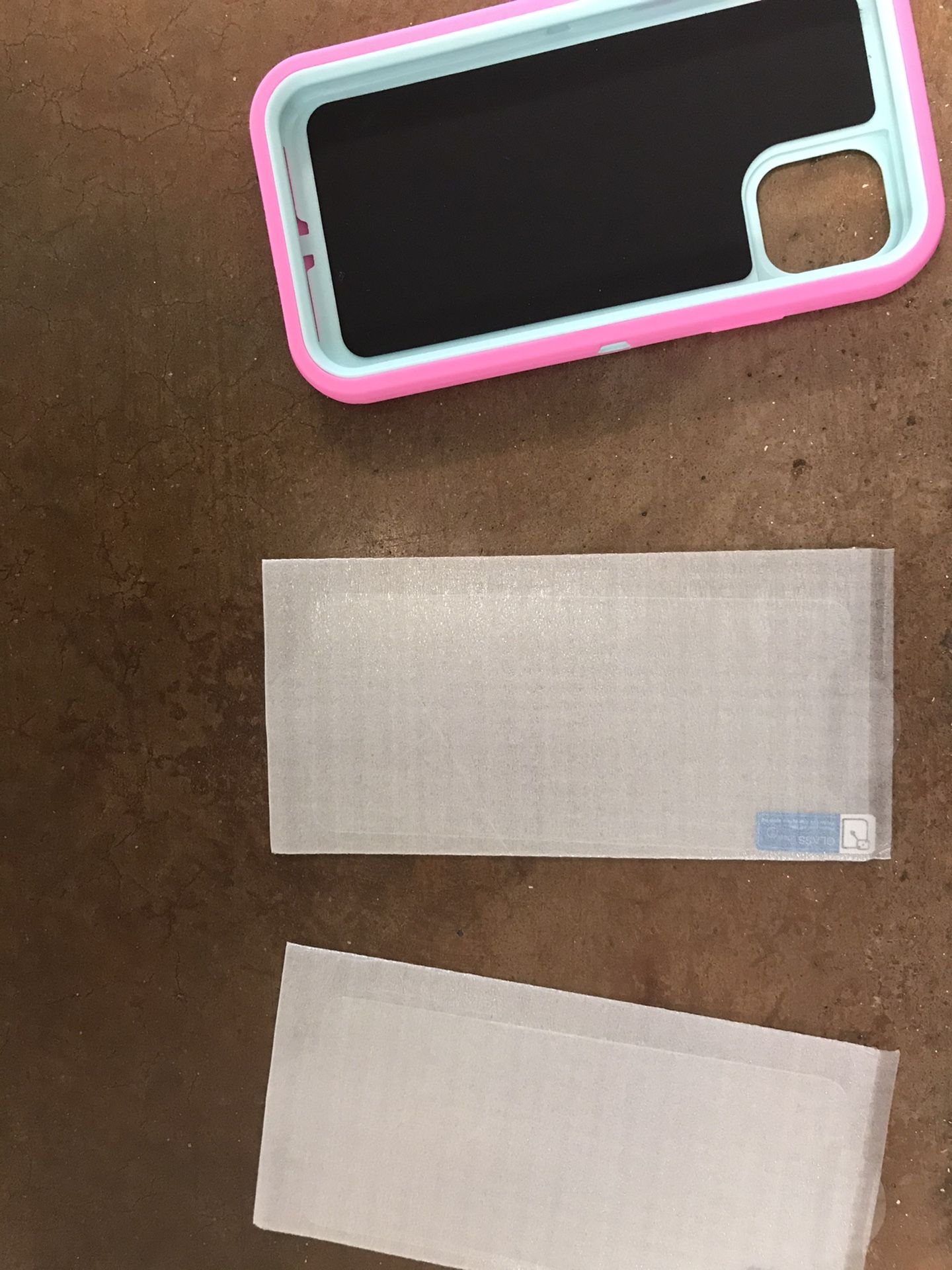 NewCaver and two screen protector never used I phone 11pro