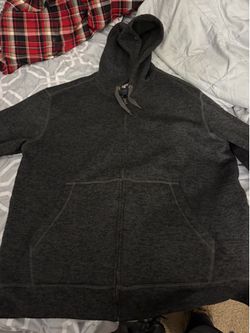 Green and black zip up