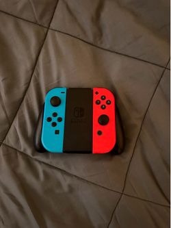 Neon Blue/Red Joy-Con Controllers with joy con grip
