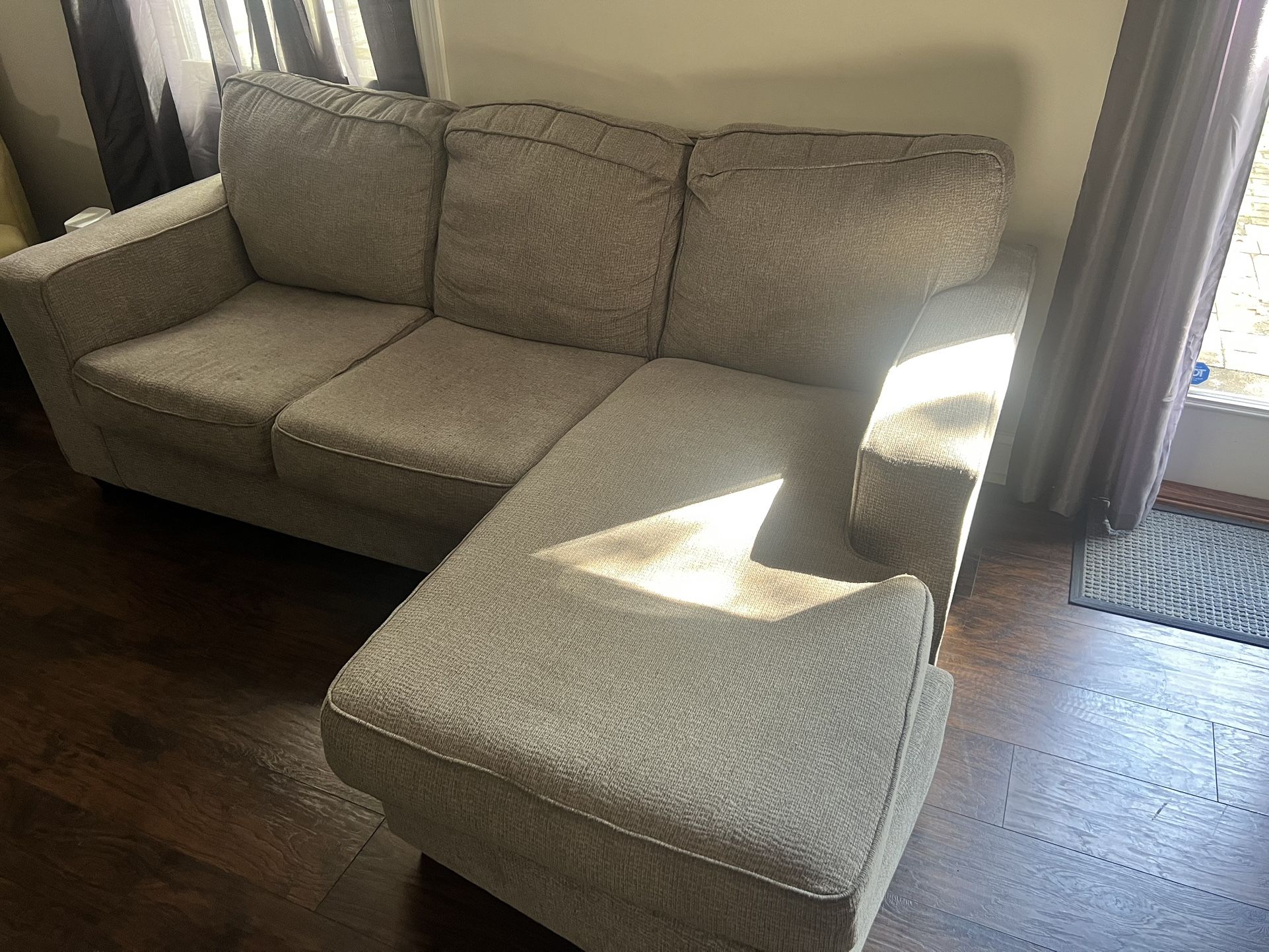 Gray Sofa And Green Chair