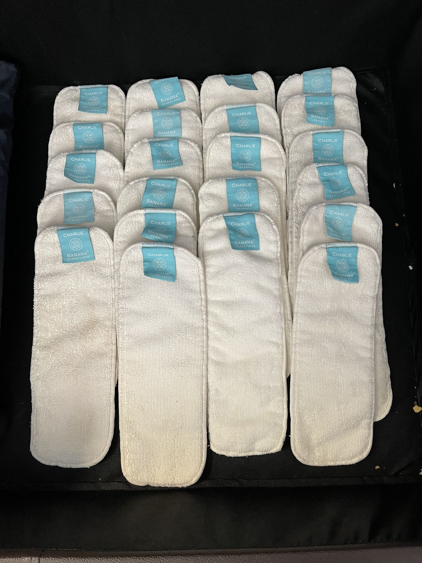 Charlie banana Clothe Diapers 7 clothe diapers - may need elastic replacement 22 extra reusable inserts Lots of baby items available and not posted