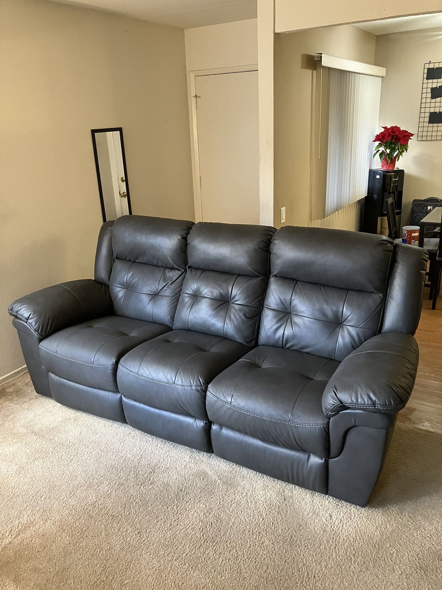 Bob’s Furniture Gray Navigator Reclining Couch