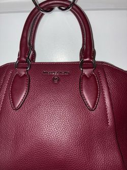 Michael Kors purse and orange Kate Spade purse
