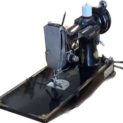 Singer 221 Featherweight sewing machine, manufactured on August 22, 1950. The serial number is AJ78732