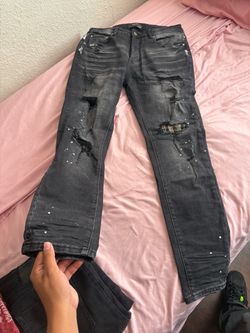 Black paint Amiri jeans