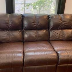 Reclining Brown, leather couch and loveseat good