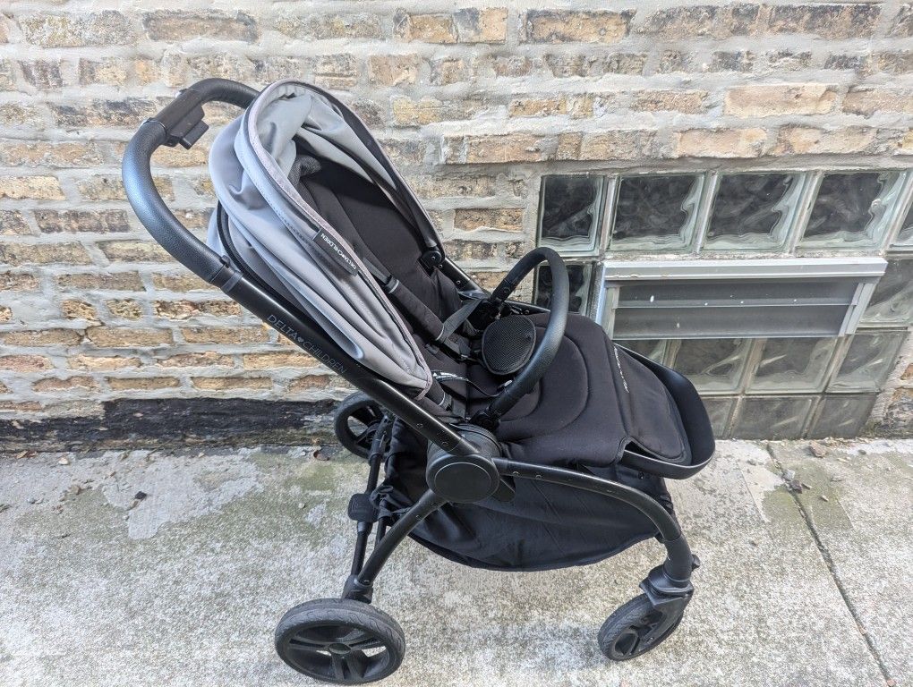 Delta Children Revolve Reversible Stroller - Leather Handlebar