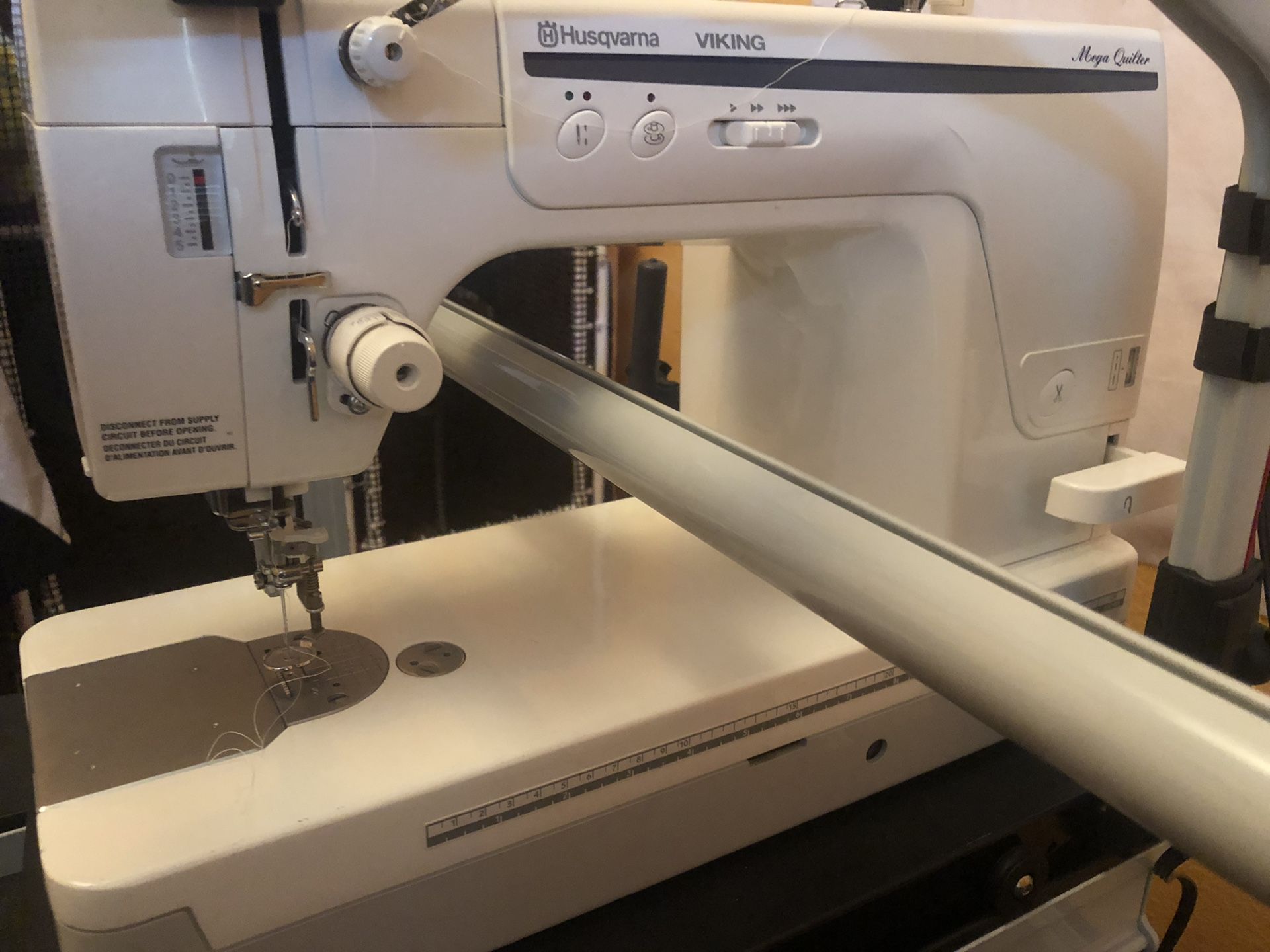 Husqvarna Viking Mega Quilter Sewing Machine and Next Generation Grace