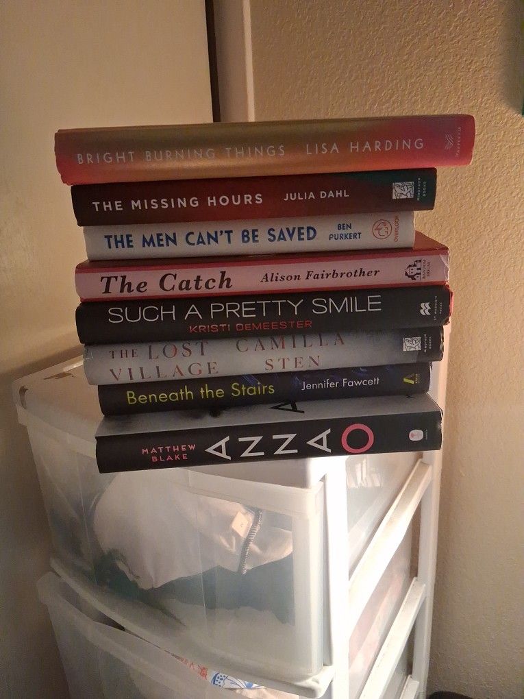 8 Hard Cover Books