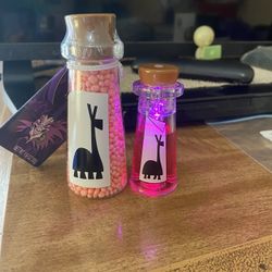 Disney Kuzco’s Potion Bottle Glow Cube & Candy Potion Set