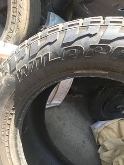 1 single Falcon tire 305/255R20