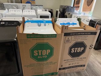 GE profile brand new in box washer and dryer set electric with warranty