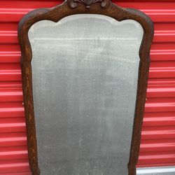 Antique beveled mirror- oak framed