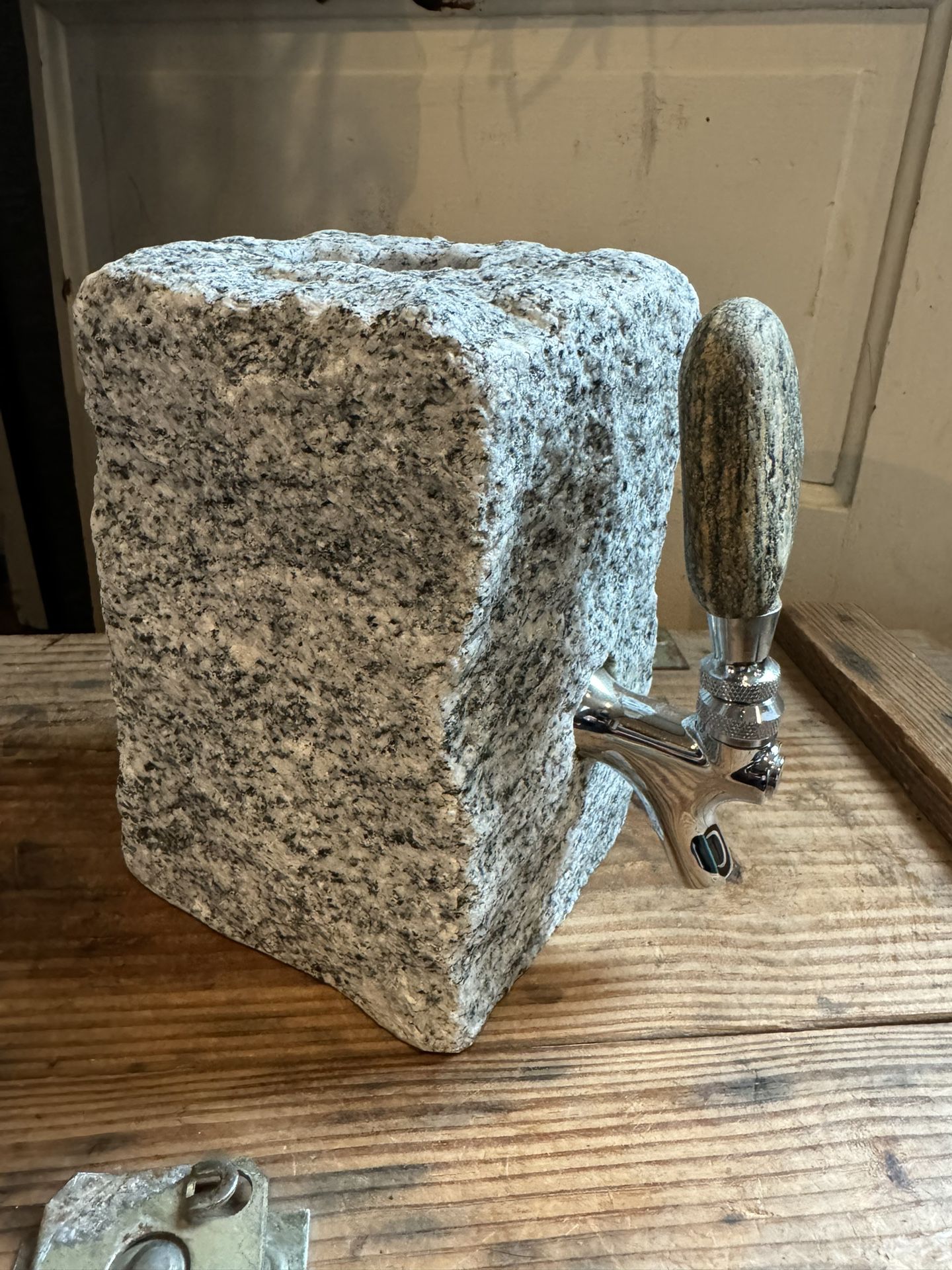 Granite Drink Dispenser With Natural Stone Handle.