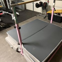 Gymnastics Bar and Mats 