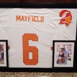 BAKER MAYFIELD OF THE TAMPA BAY BUCCANEERS, FRAMED THROWBACK JERSEY.