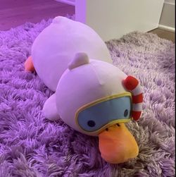 Duck plushy swimming