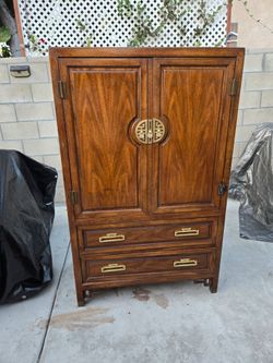 Asian-Style Wooden Armoire with Brass Hardware