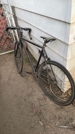 Fixing selling as his back tire needs to tube