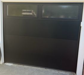 8x6’9 lustra black garage door ( like new )