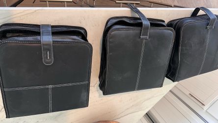 DVD case holder  contains 720 DVD of assorted movies