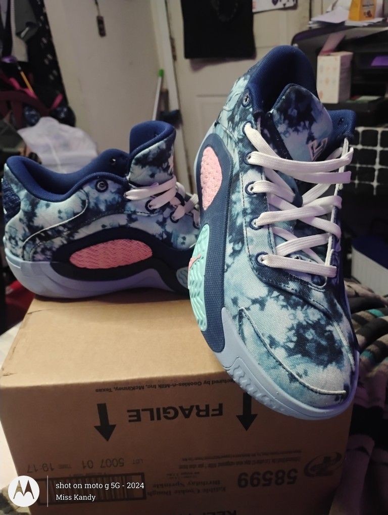 Nike Jordan Tatum 2 GPX basketball shoe in the Blue Void/Bleached Coral colorway.